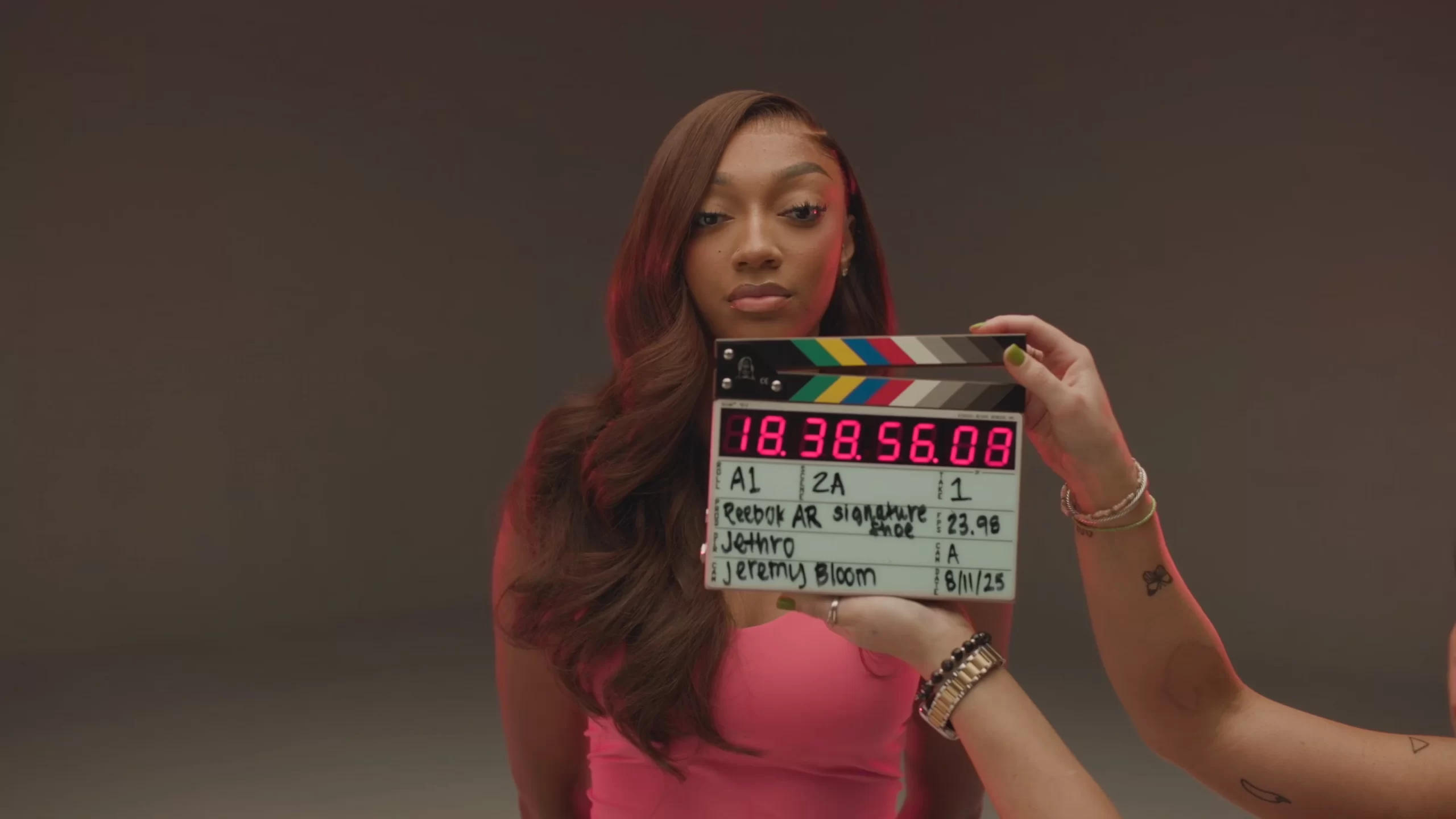 Reebok campaign frame with Angel Reese