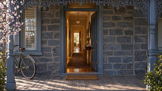 A Norwood front door open to the hallway